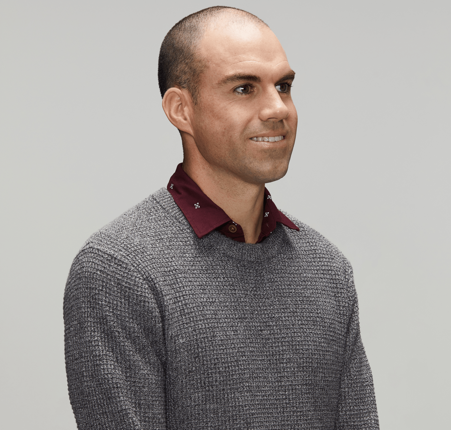 Personal stories - Mark Police officer wearing smart casual clothes looking to right of camera; white male early to mid-thirties